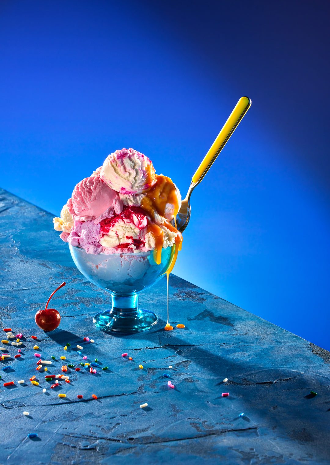 Blue Hour vinyl backdrop. Vinyl image is of a light blue to dark blue smooth gradient perfect for food, drink, and product photography.