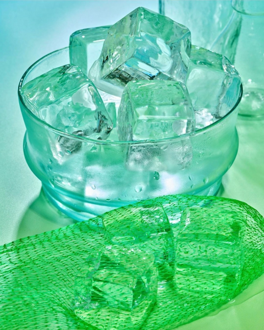 Vinyl surface of solid gradient light and green gradient surface perfect for food, drink, and product photography.