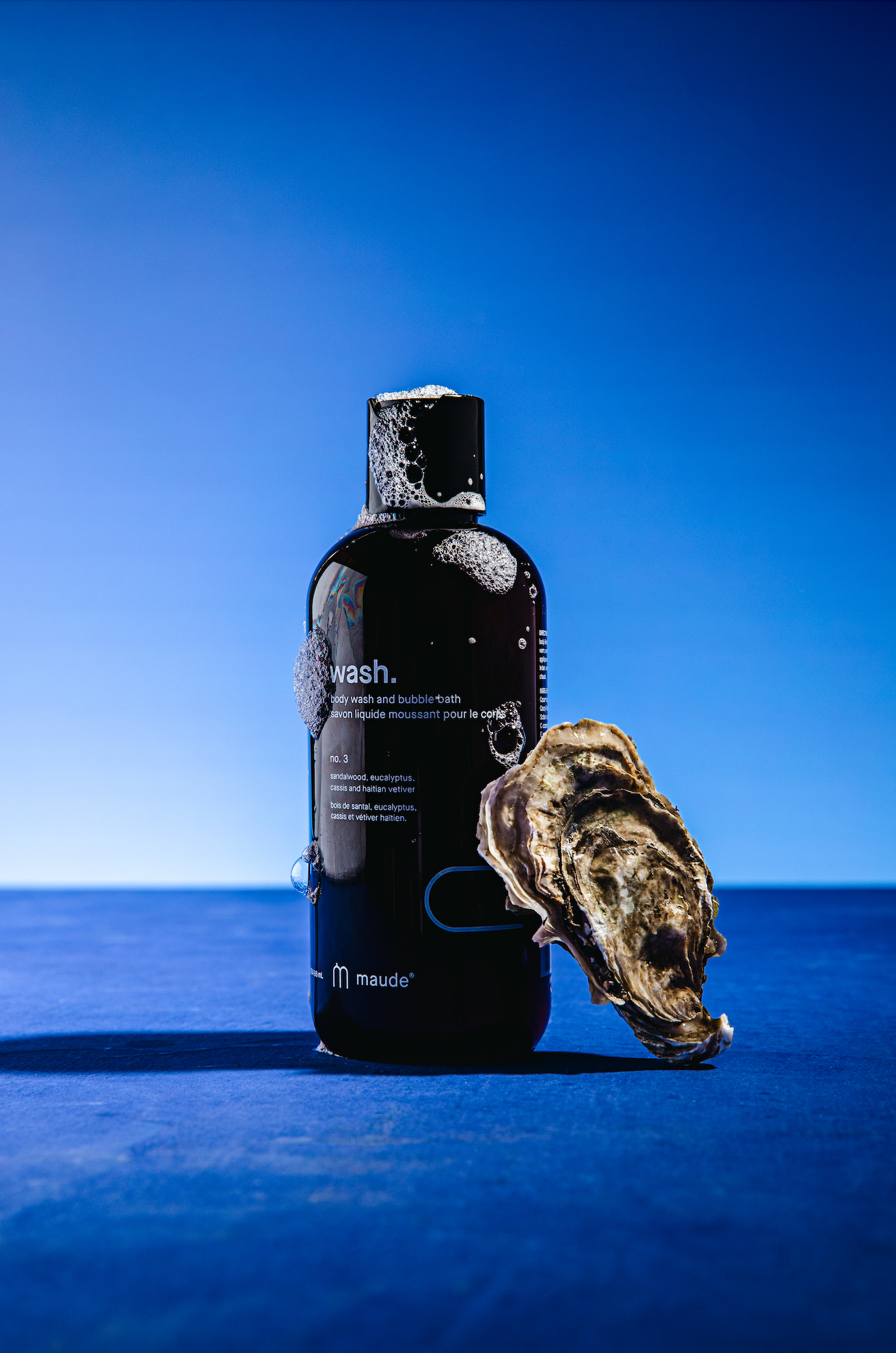 Blue Hour vinyl backdrop. Vinyl image is of a light blue to dark blue smooth gradient perfect for food, drink, and product photography.