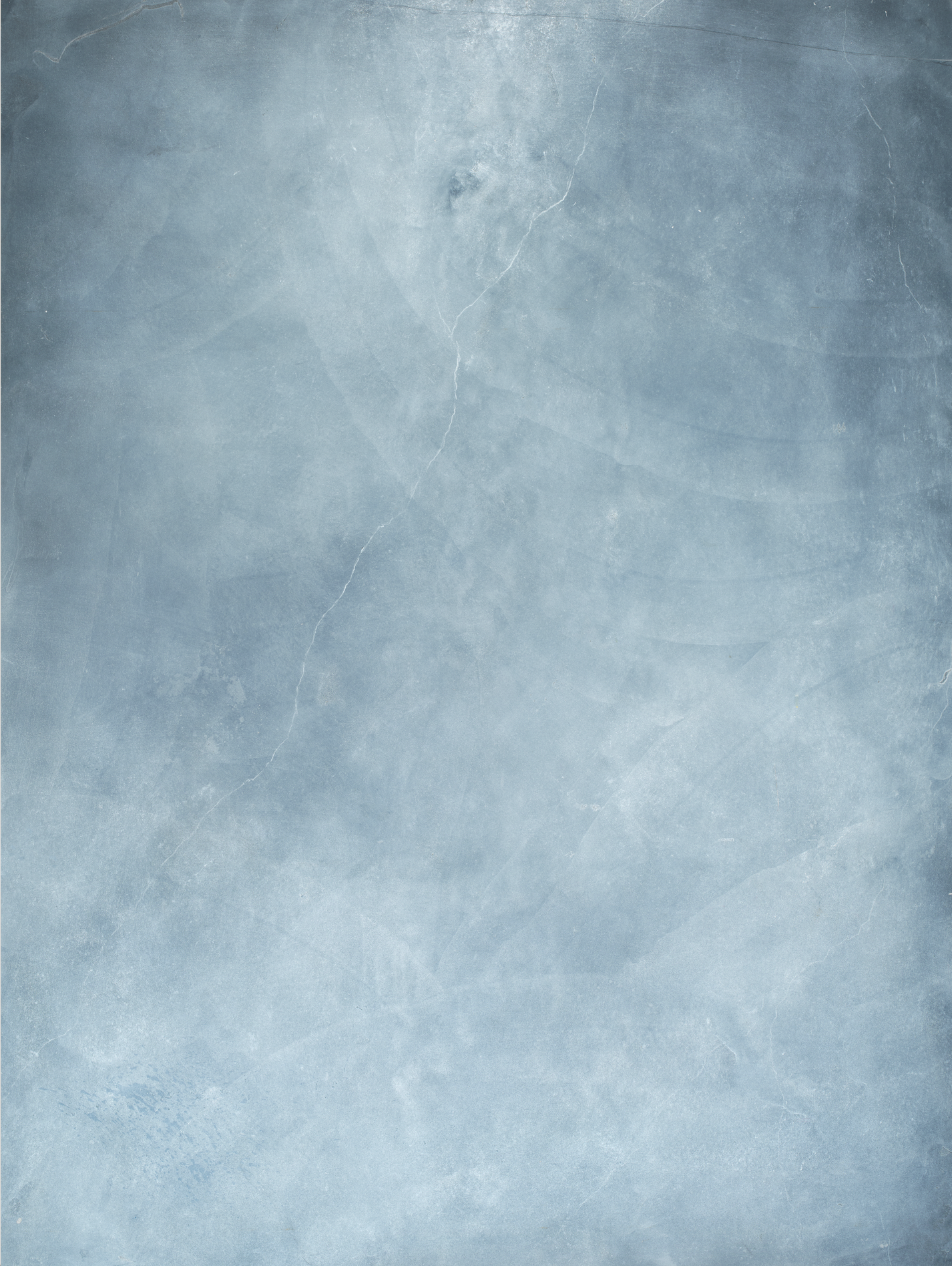 Cool toned grey and blue stone textured surface backdrop