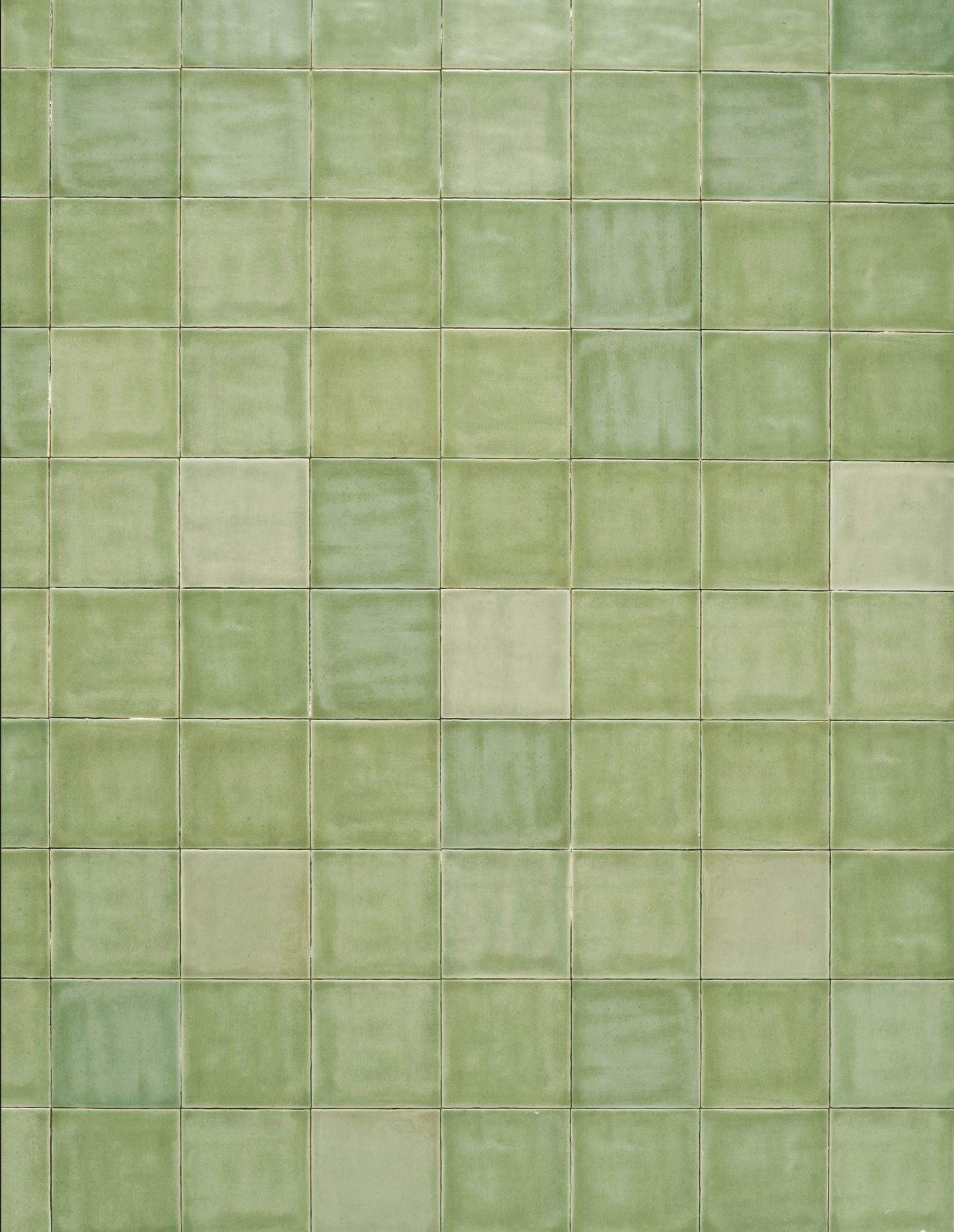 Square light green tile with white stained grout vinyl backdrop