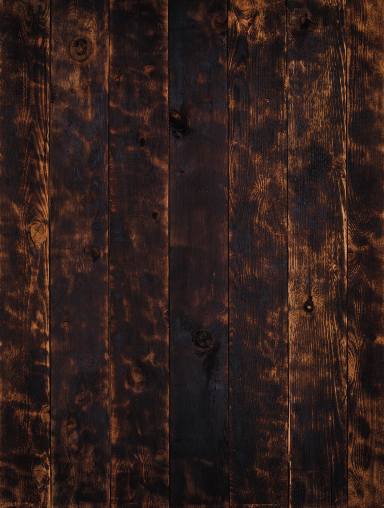 Vinyl surface of burnt light brown wooden slats