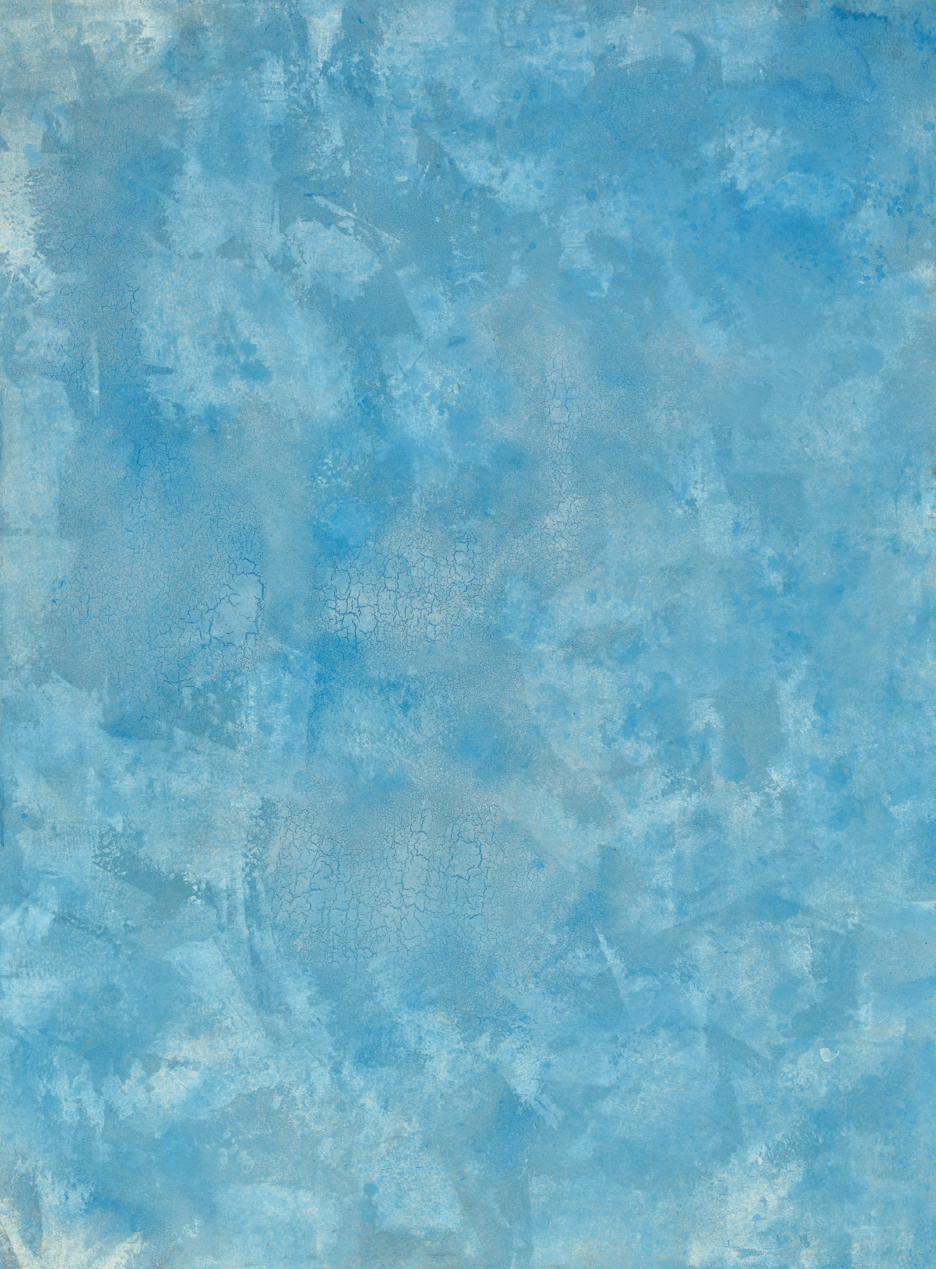 Big Sky vinyl backdrop. Vinyl image is of light blue and white cracked plaster textured surface perfect for food, drink, and product photography.