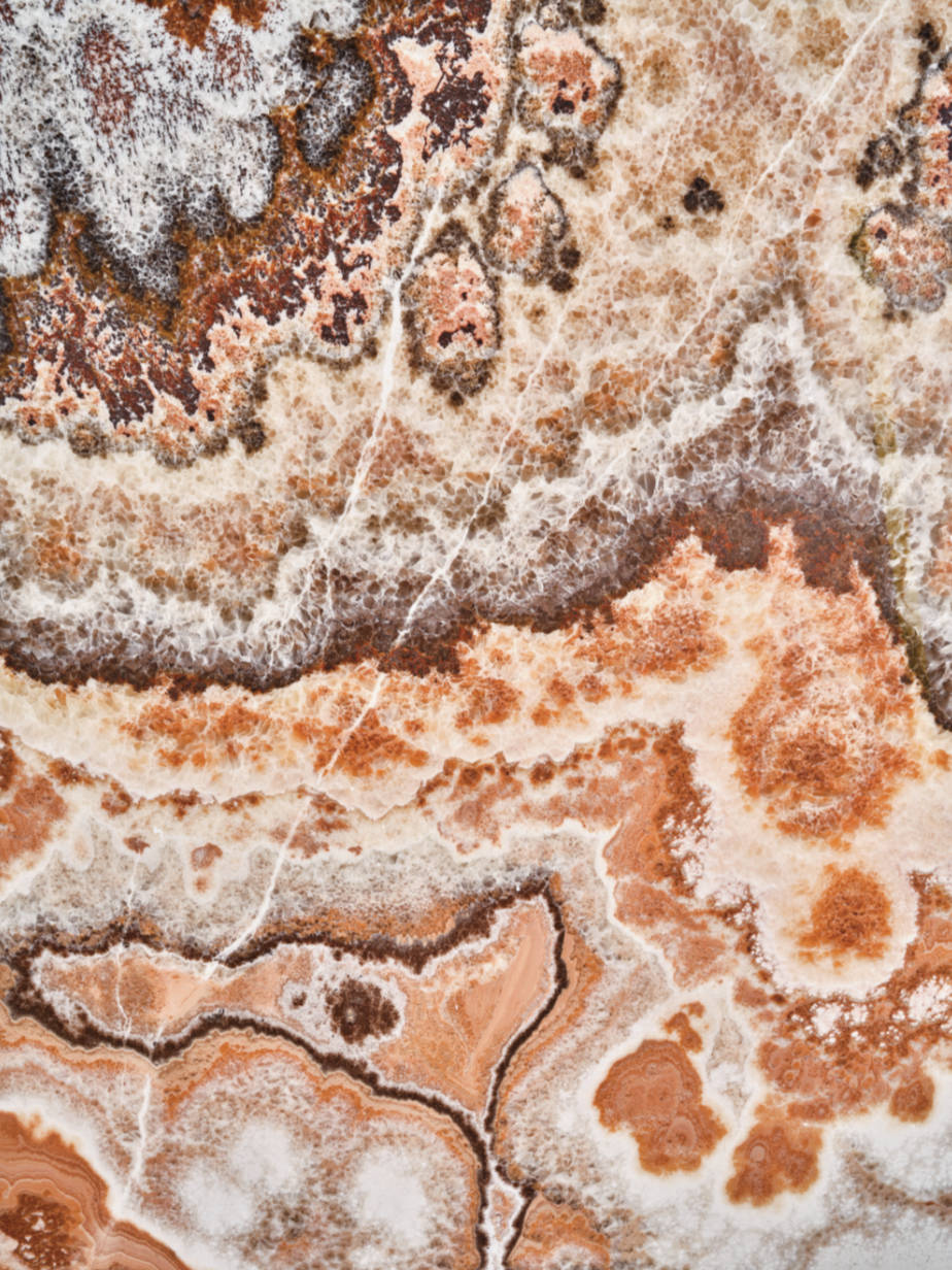 Black Onyx vinyl backdrop for photography. Warm toned brown and cream colored stone vinyl backdrop perfect for food, drink, and product photography.