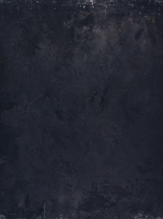 Blackboard vinyl backdrop. Vinyl image is of black, gray, and minimal white painted textured plaster surface imitating a blackboard appearance perfect for food, drink, and product photography.