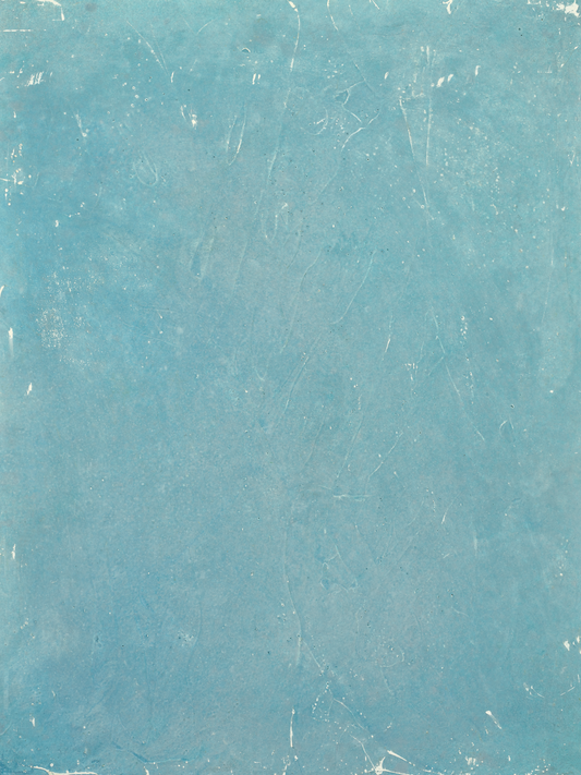 Blue Skies vinyl backdrop. Vinyl image is of a gray toned blue and white scratched/textured surface perfect for food, drink, and product photography.