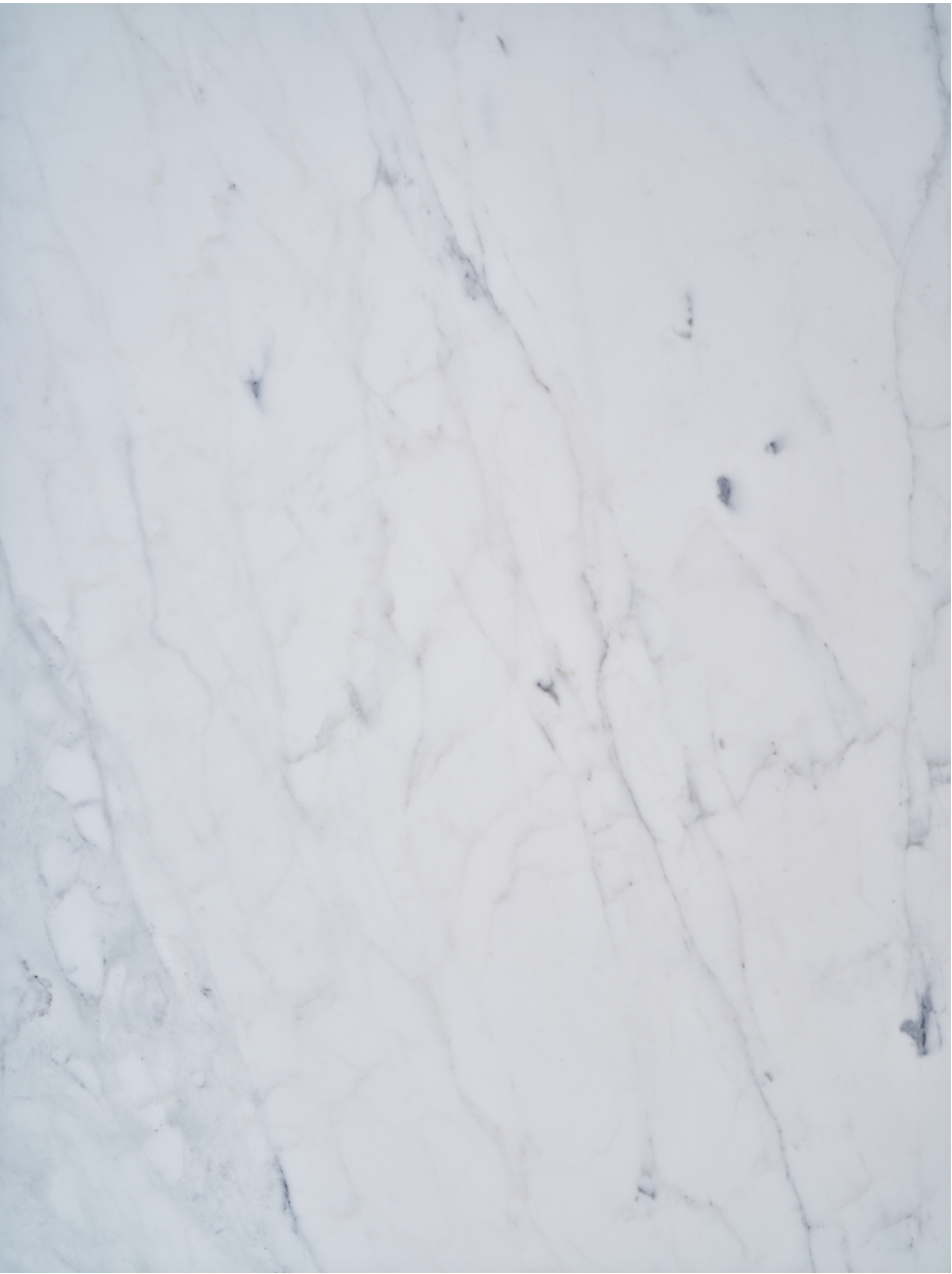 Caldia vinyl backdrop. Vinyl image is of white stone with marbled gray streaks.