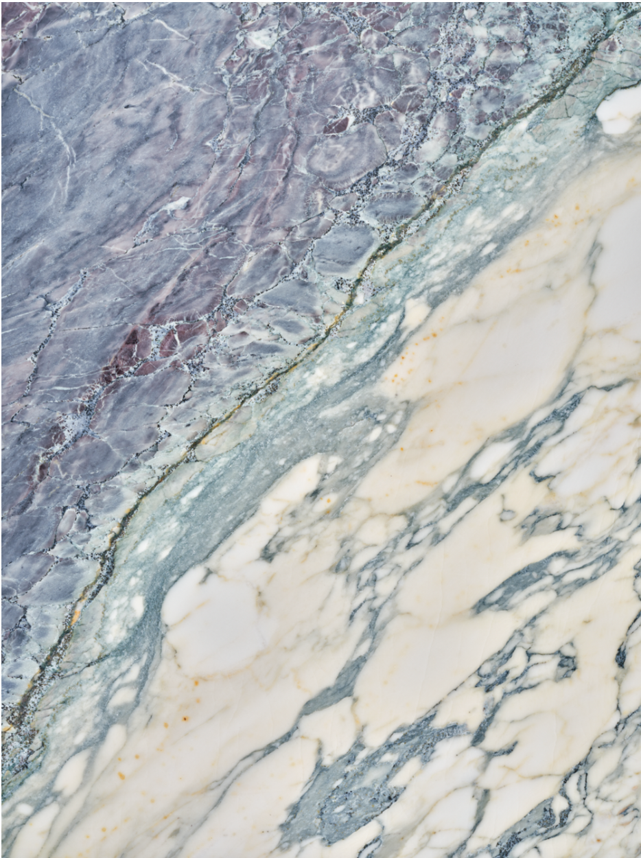 Capraia vinyl background. Vinyl image is of dark blue, light blue, and cream colored marble stone.