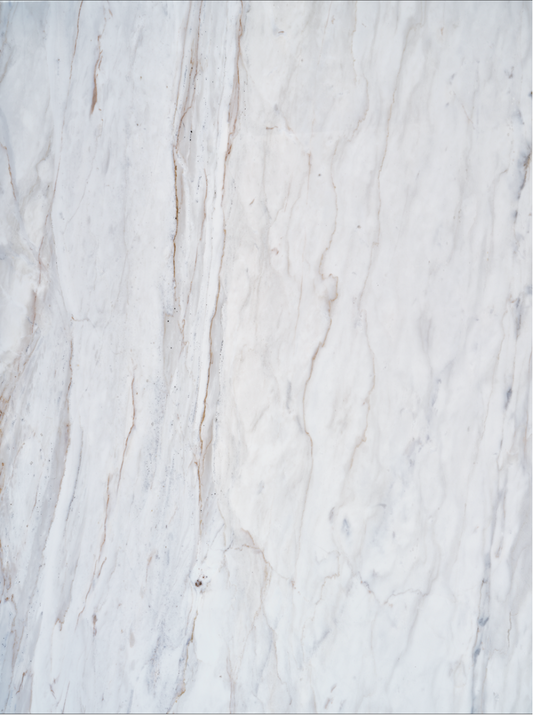 Delicato vinyl backdrop. Vinyl image is of a cool toned white marble stone with light streaks of soft gray and rich brown