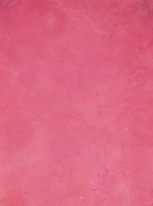 Dragon Fruit vinyl backdrop. Vinyl image is of a vibrant deep pink with hints of beige and cream on a textured plaster surface.