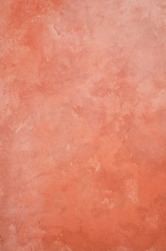 light orange and burnt orange textured surface