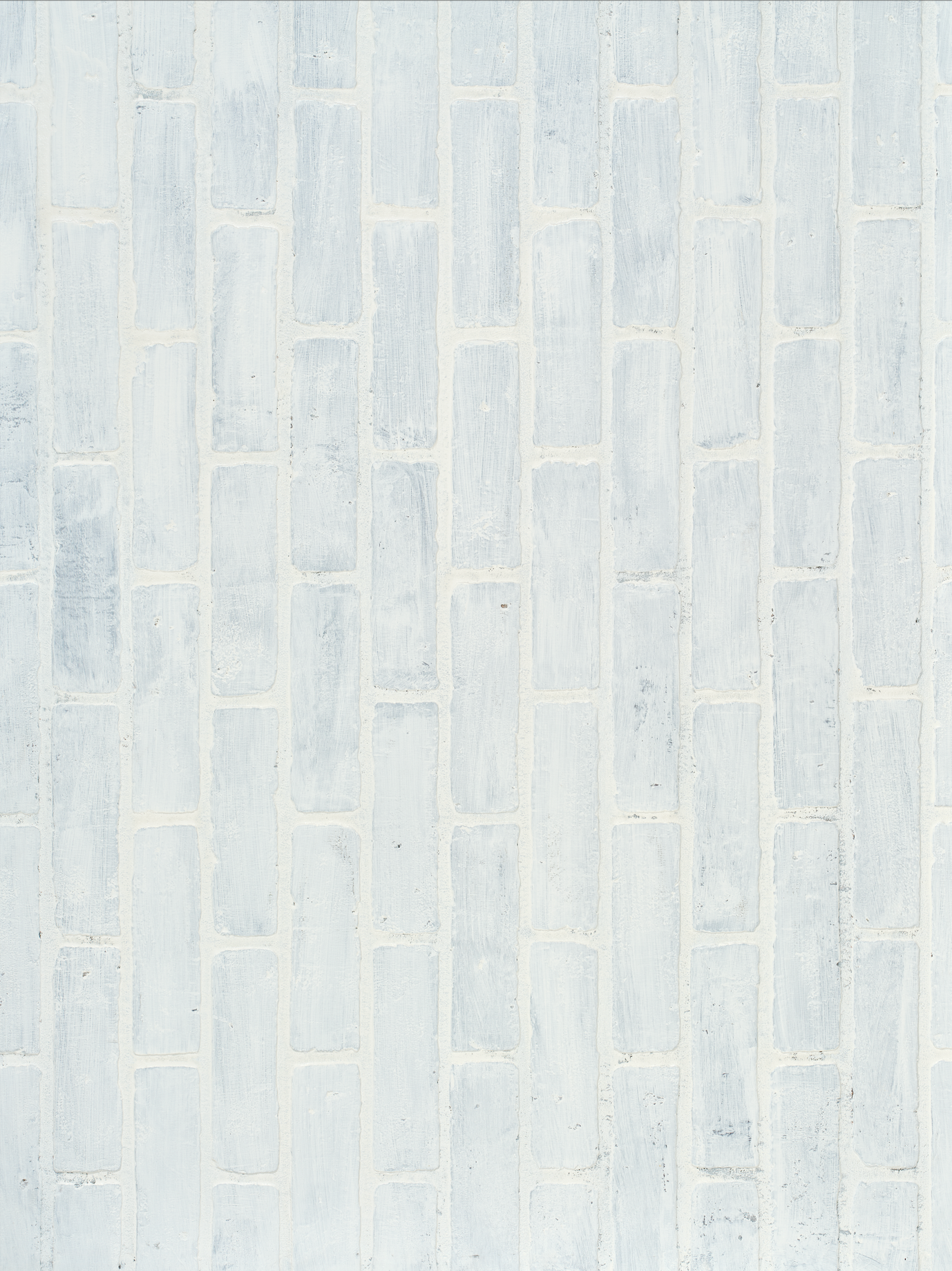 grey toned rectangle tiles with cool toned grout