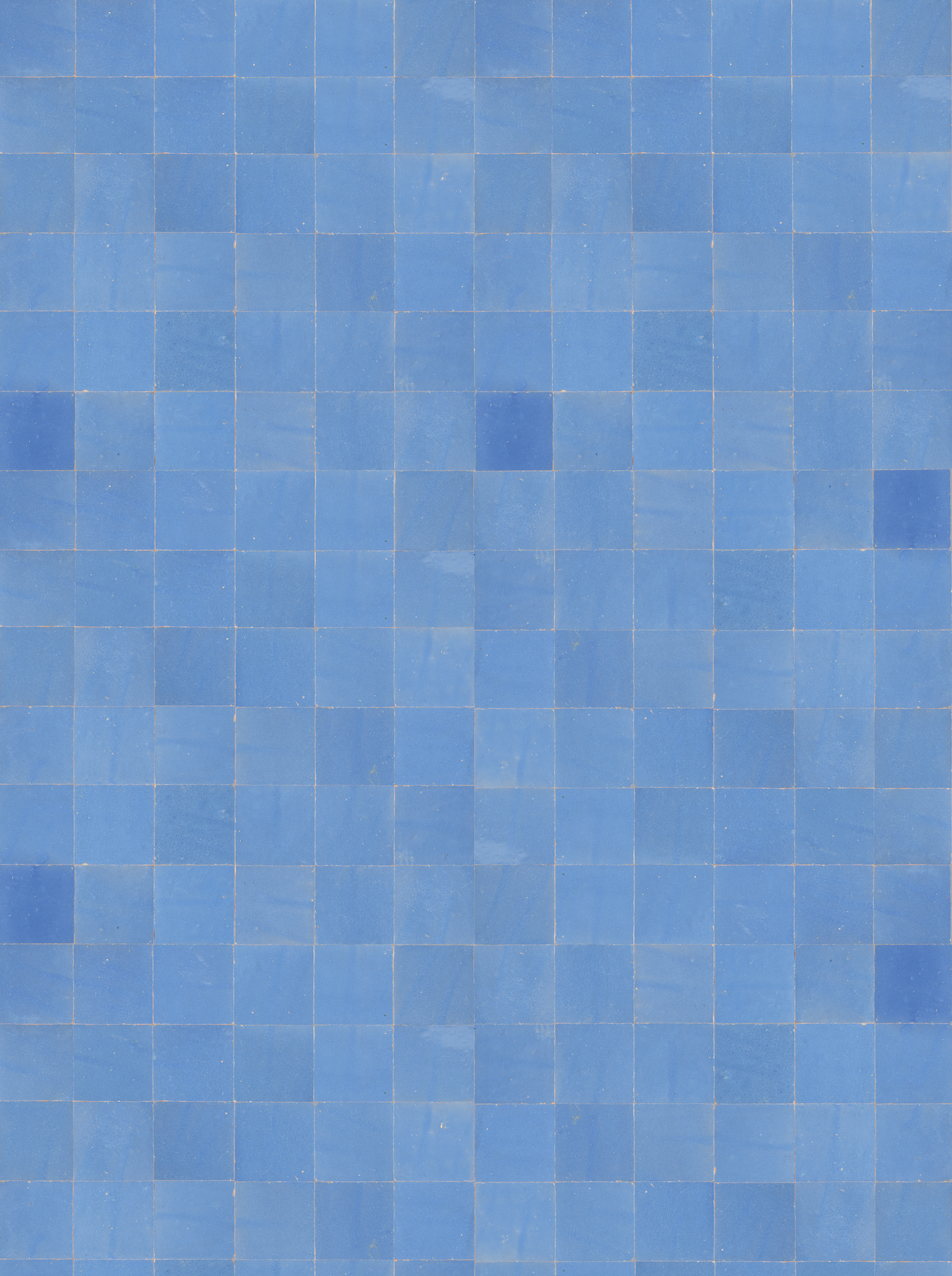 vinyl backdrop of sky colored blue square tiles with white grout