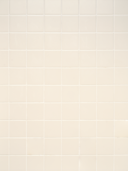 warm white toned square tiles surface with neutral white grout