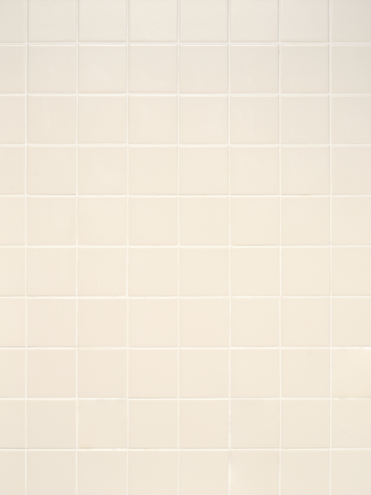 warm white toned square tiles surface with neutral white grout